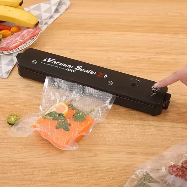 Sellador al Vacio FreshVac™ + 1 Rollo de Bolsa 5mts + 5 Bolsas extras de Regalo